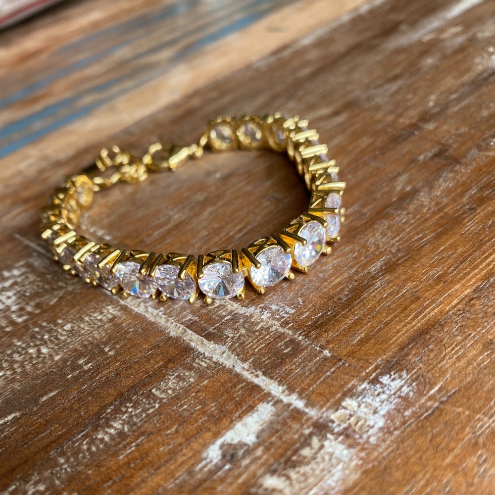 Park Lane gold with clear stone